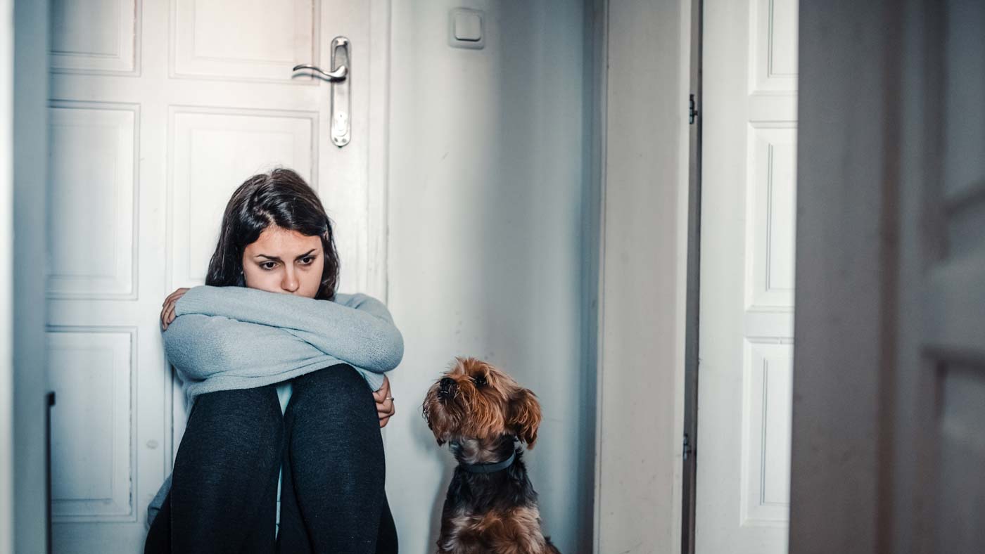 Depressed female with her dog